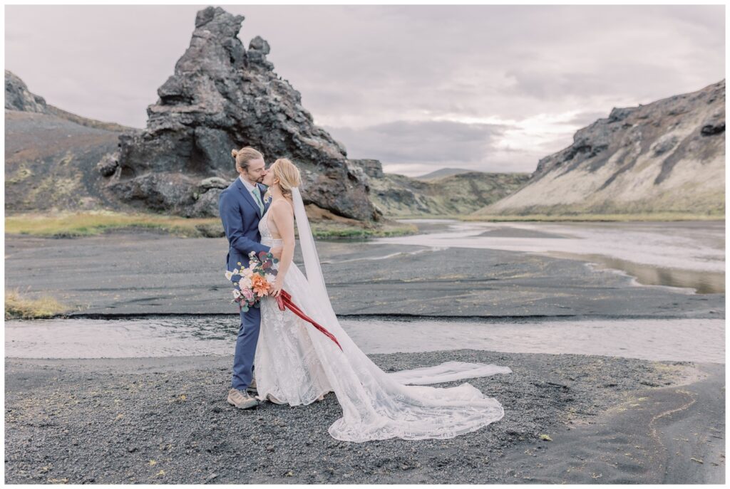 A Bride and Groom kissing at an intimate location on a F-Road during their Iceland Elopement.
