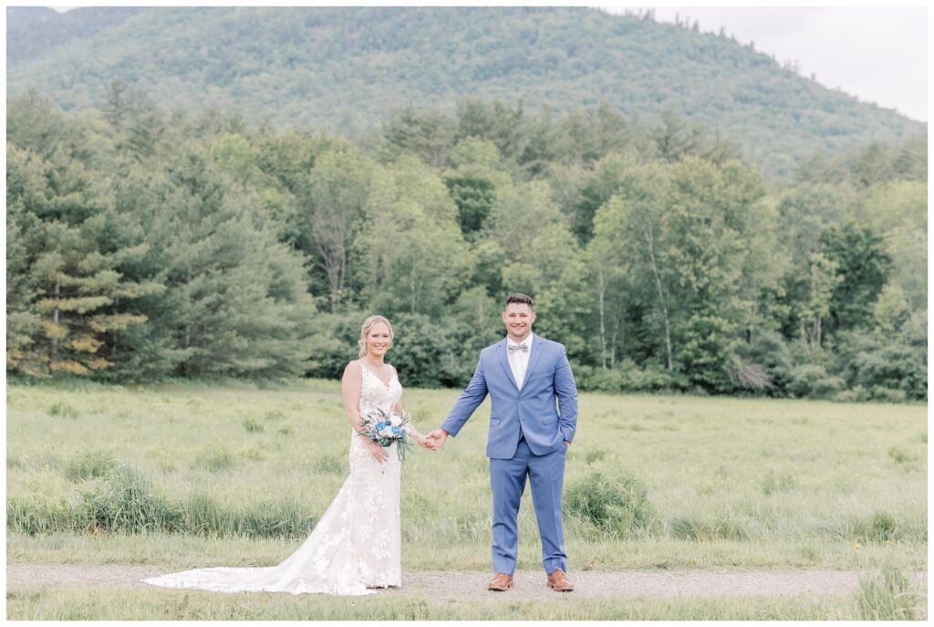 Couple holding hands during their Keene Valley elopement in the Adirondacks.